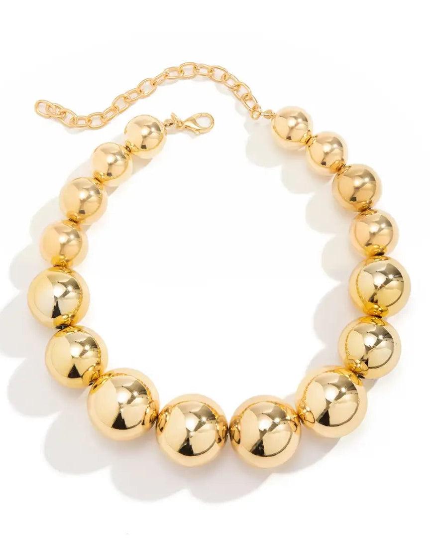 Golden punk choker necklace with oversized geometric spheres, made from 316L Stainless Steel, bold and edgy fashion accessory