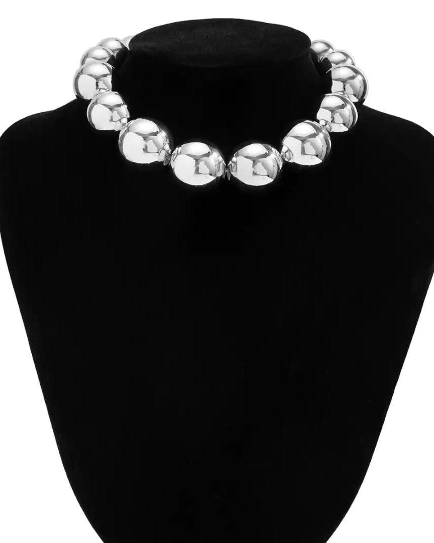 Silver punk choker necklace with oversized geometric spheres, made from 316L Stainless Steel, bold and edgy fashion accessory