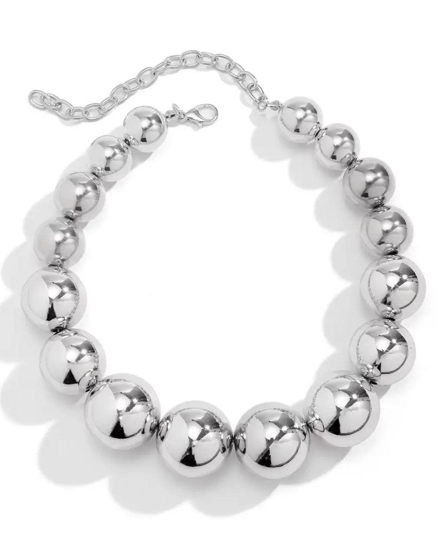 Silver punk choker necklace with oversized geometric spheres, made from 316L Stainless Steel, bold and edgy fashion accessory